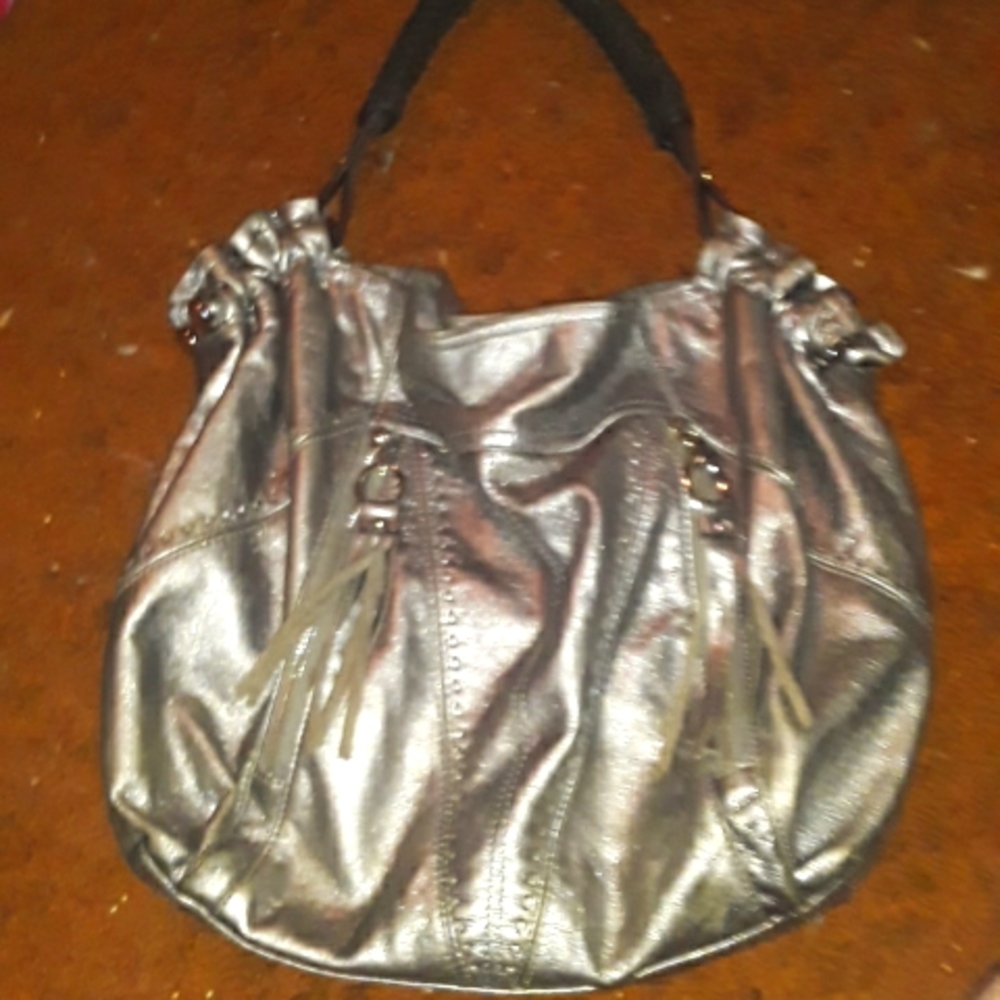 Cute metallic silver purse with leopard lining...GUC
